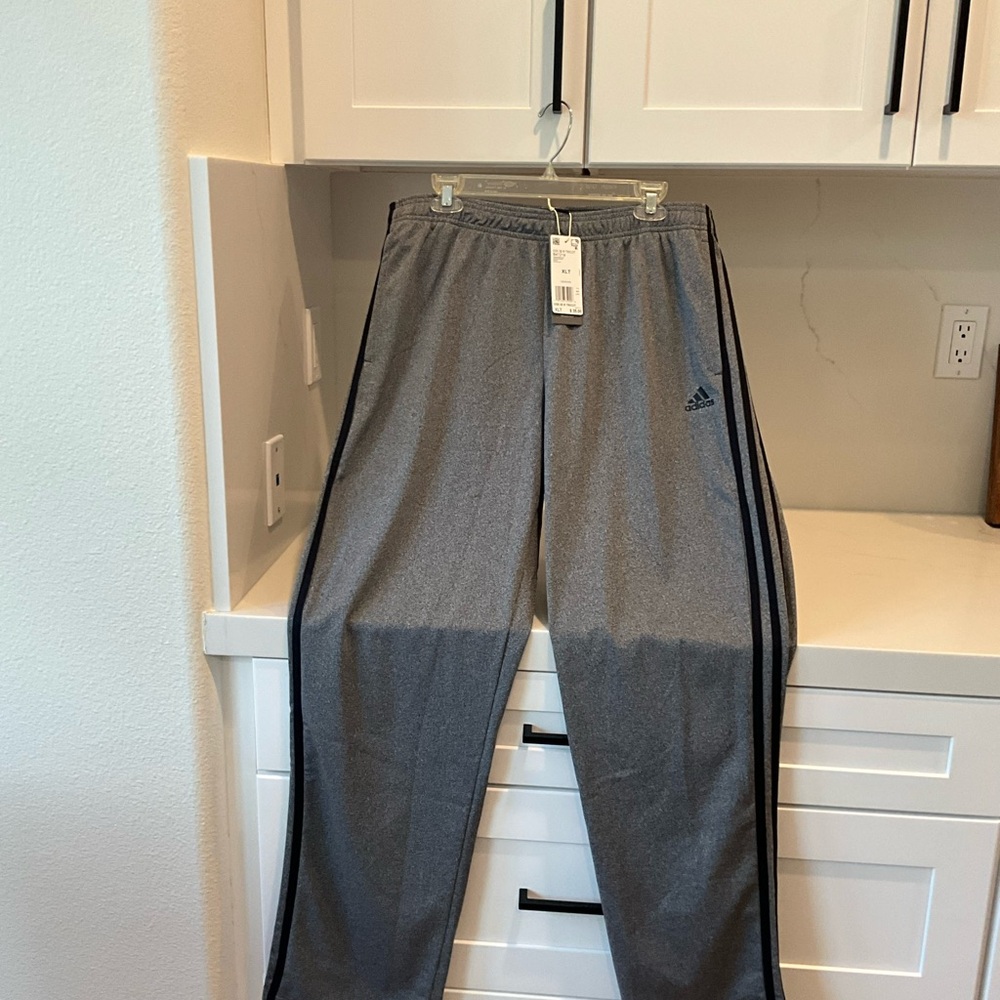 NWT MENS ADIDAS 3S R TRICOT PANTS. GREY WITH BLACK STRIPES. SIZE XLT.